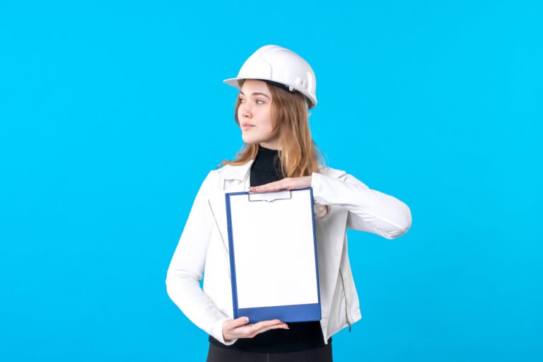 front-view-young-female-architect-holding-file-note-blue