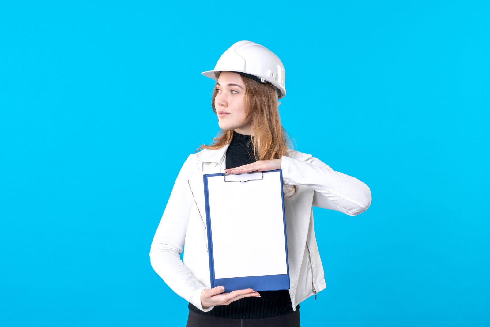 front-view-young-female-architect-holding-file-note-blue